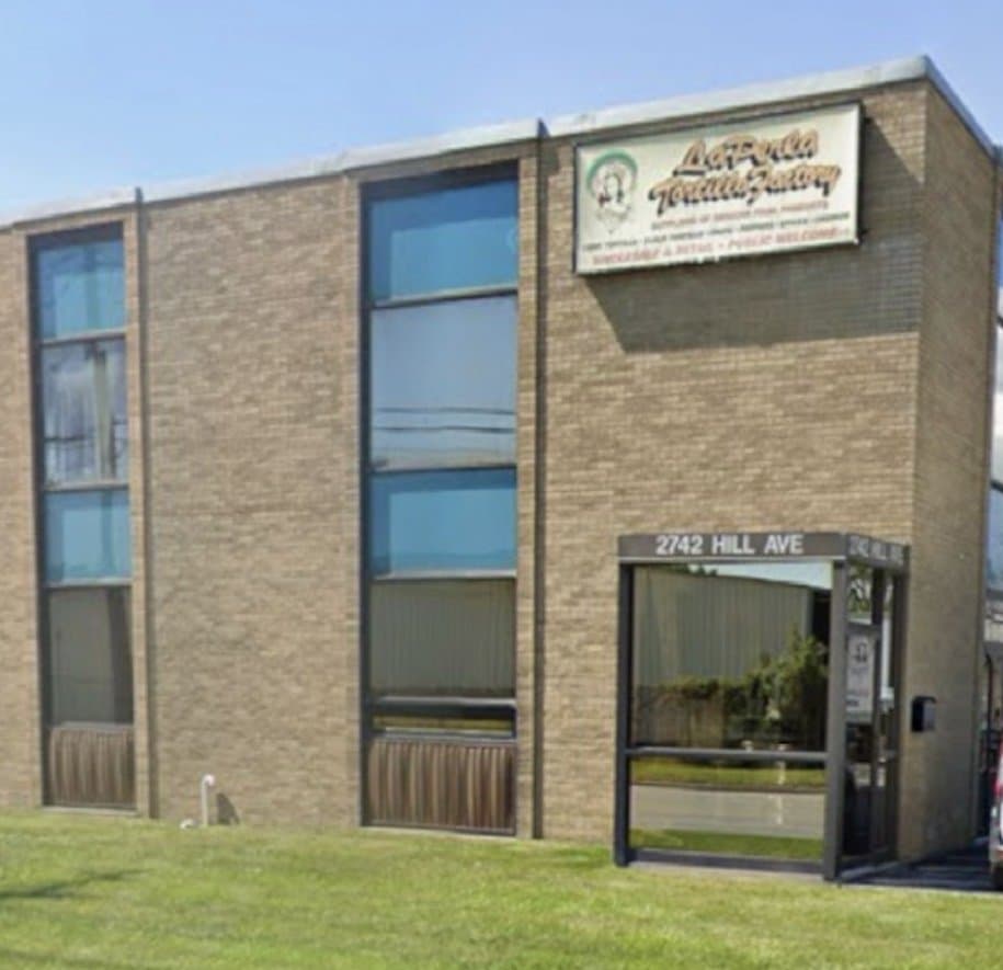 The La Perla Tortilla Factory storefront at 2742 Hill Ave in Toledo, Ohio